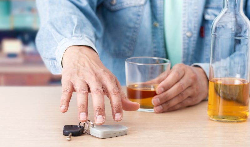 drunk-man-taking-car-key